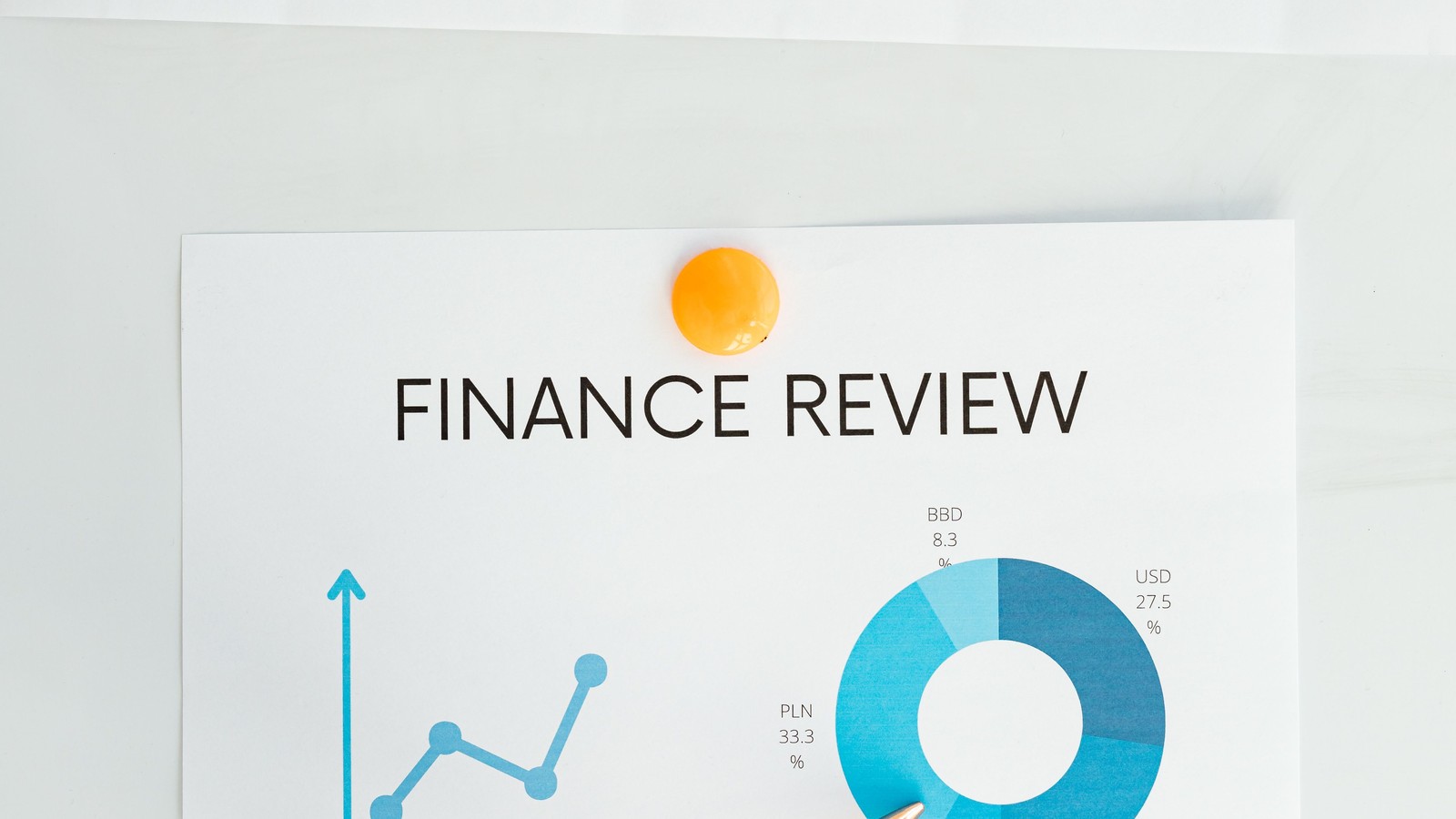 Finance professional reviewing an analysis chart