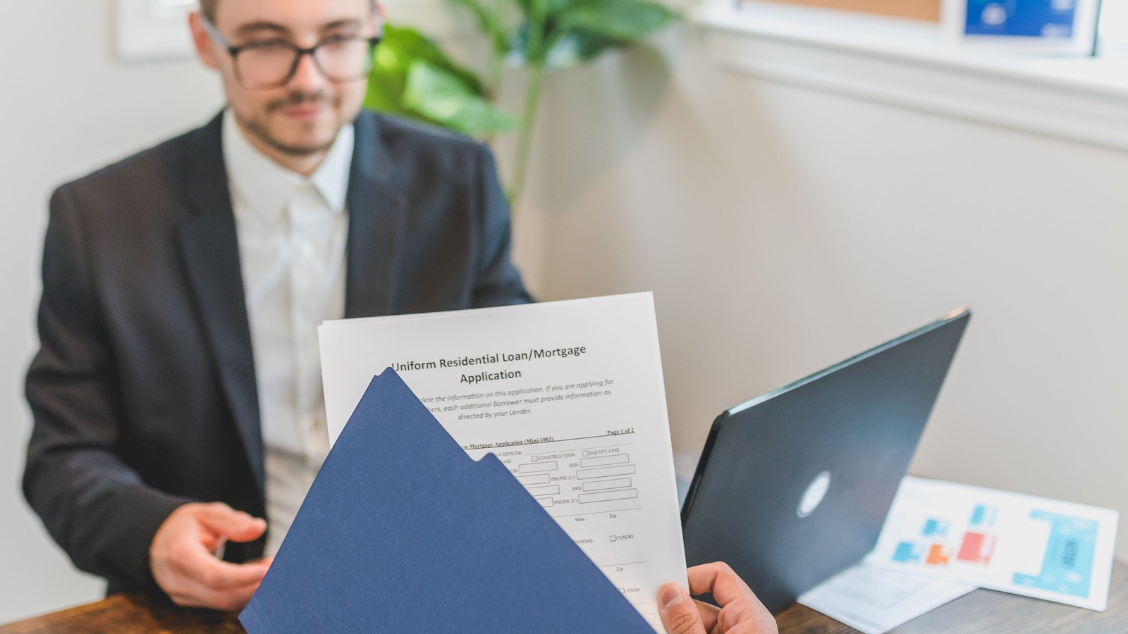 Close-up of loan documents being reviewed