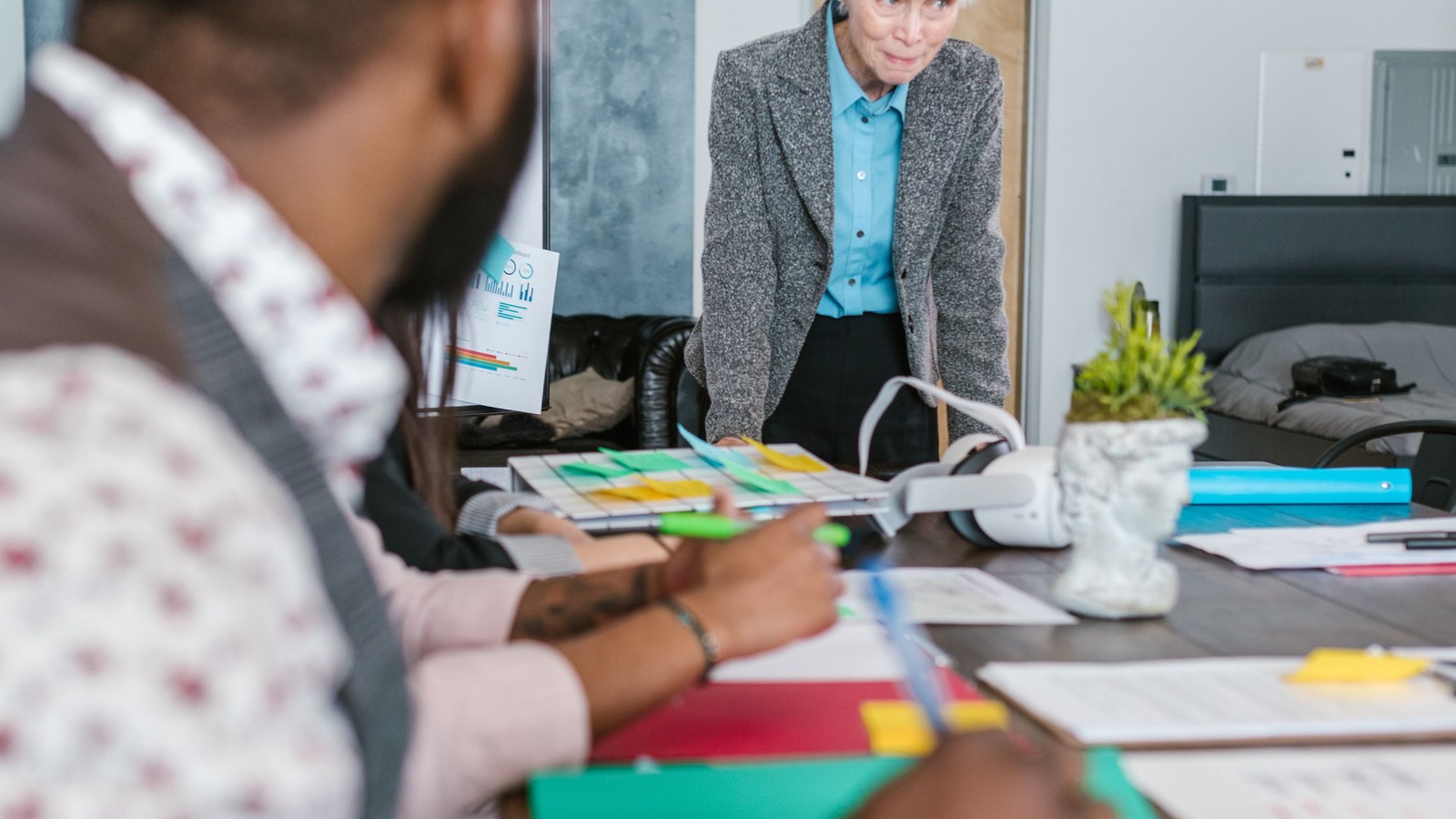 Entrepreneurs discussing business information in a meeting