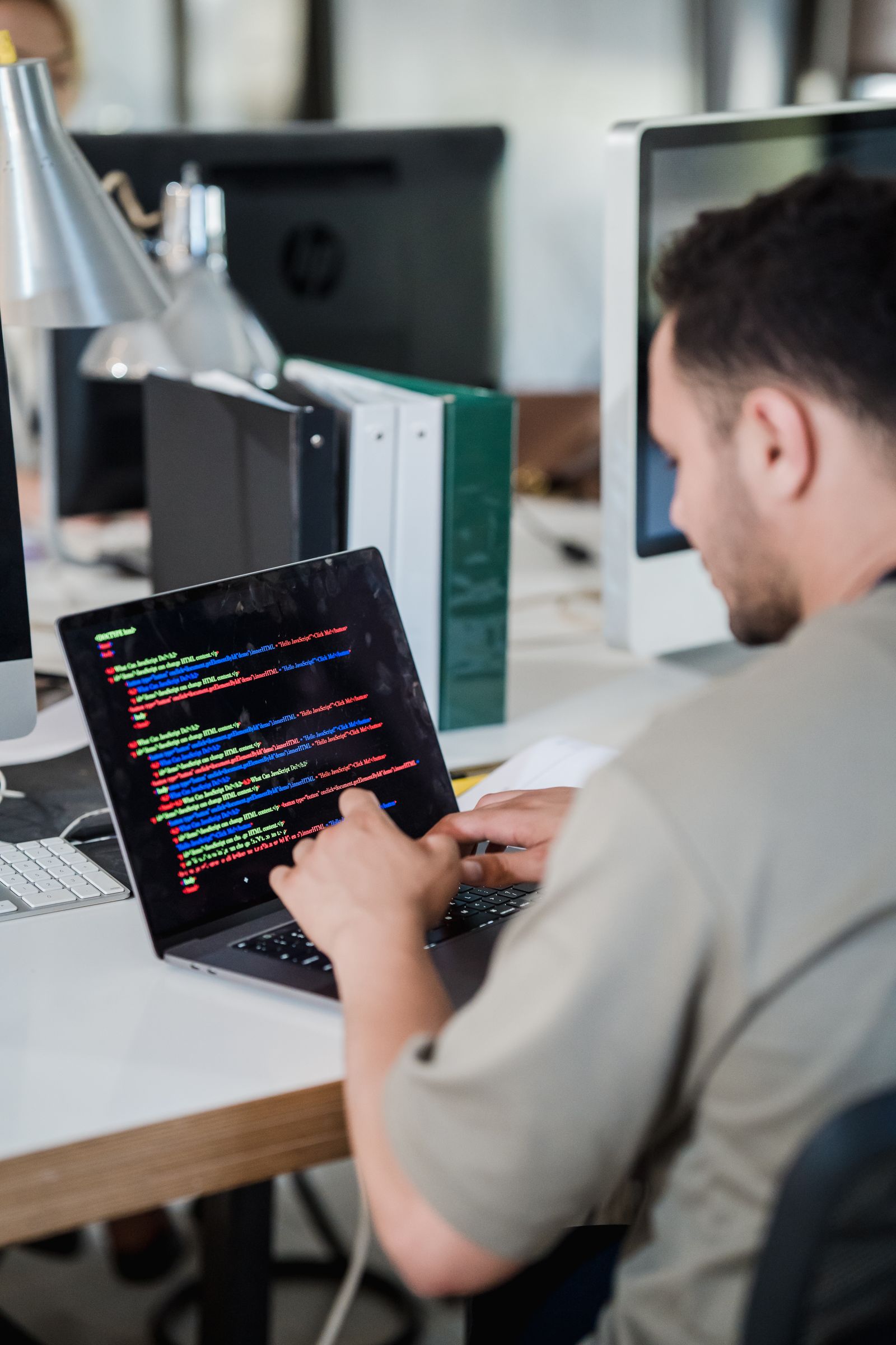 Developer working with code in an office