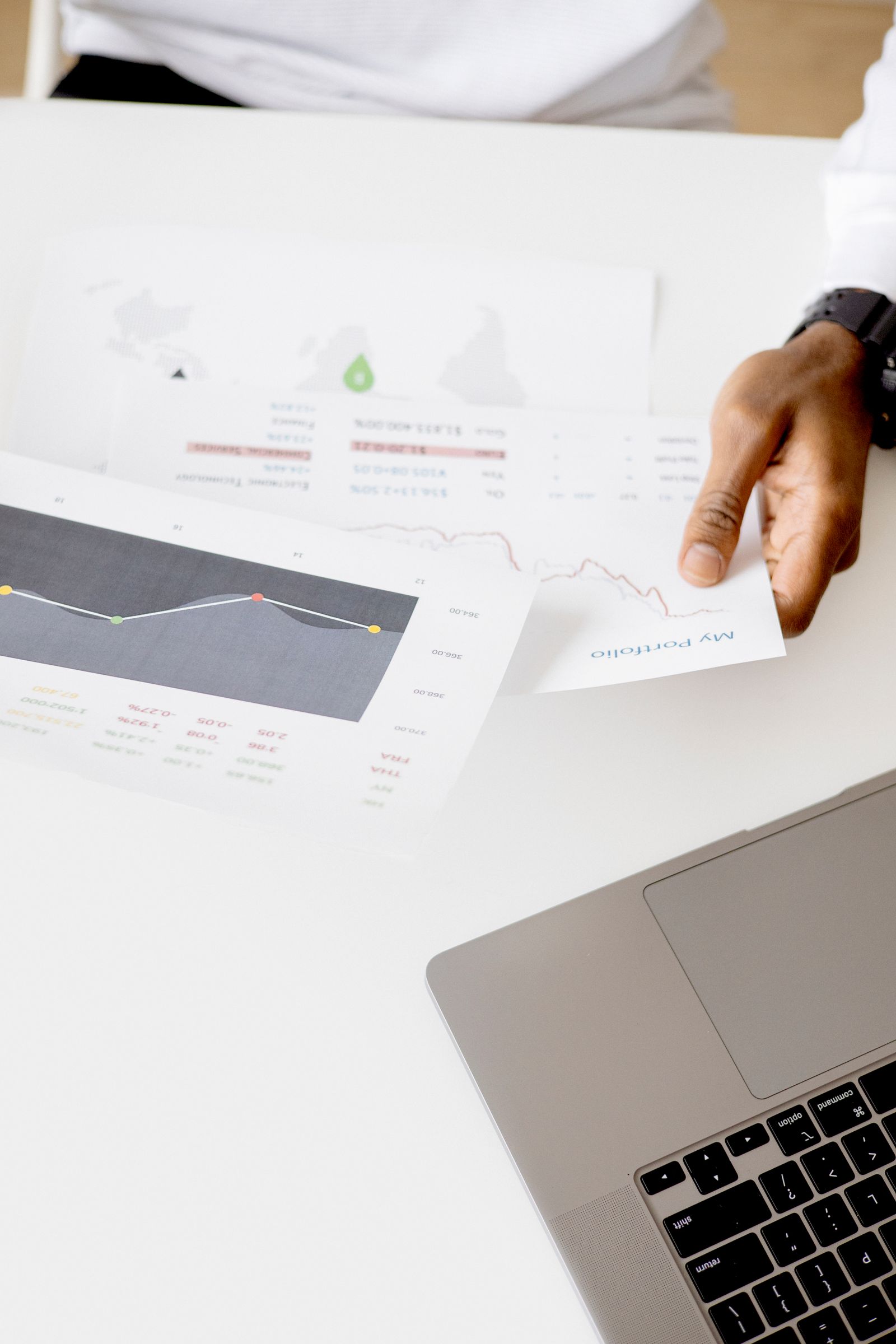 Business reports on a laptop
