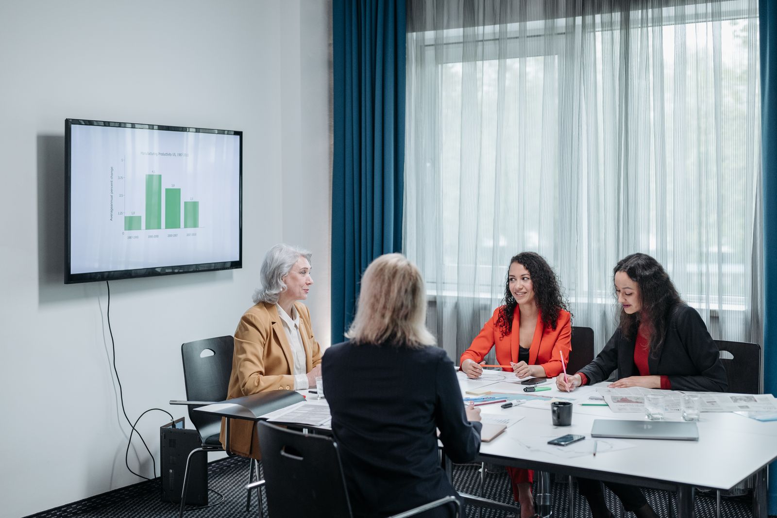 Colleagues watching an office presentation