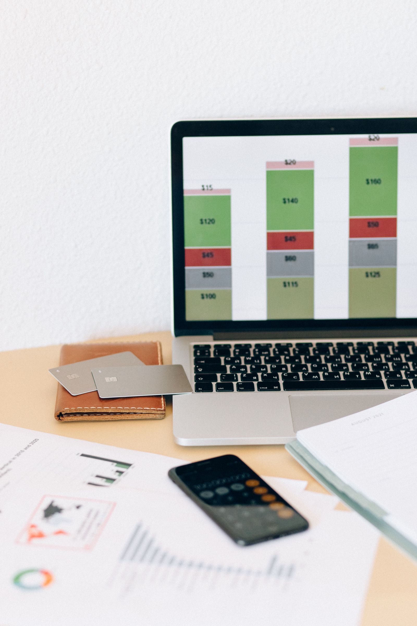 Financial charts and documents at a workspace
