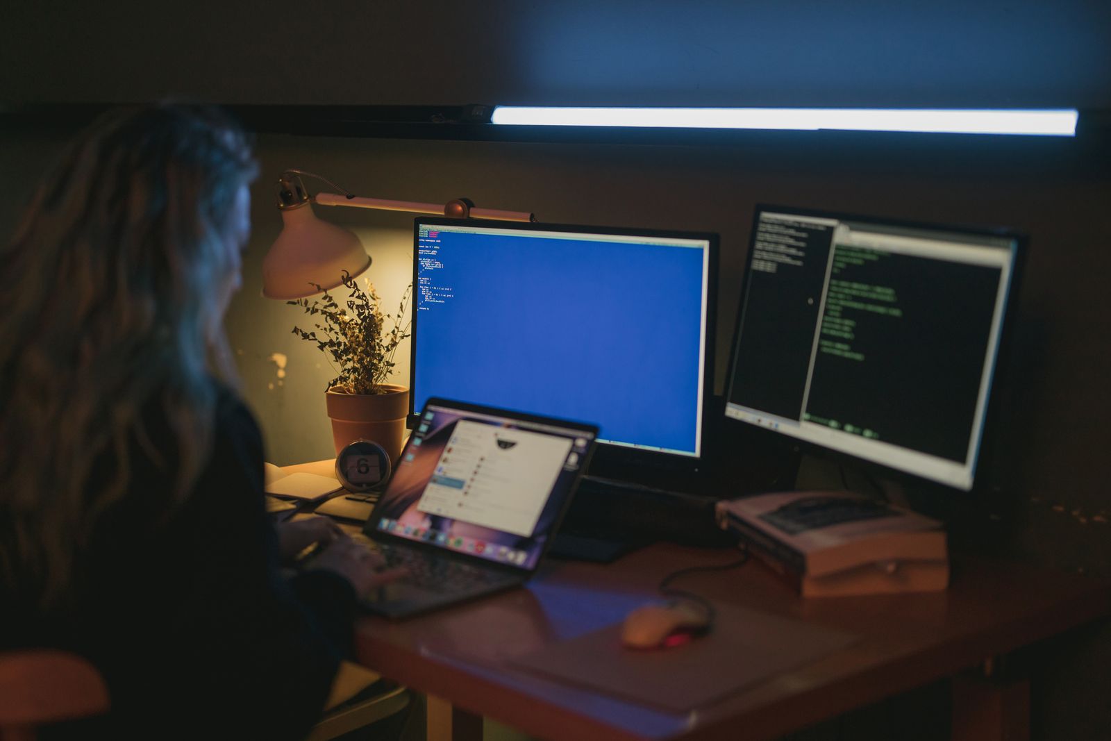 Security analyst monitoring systems at a workstation
