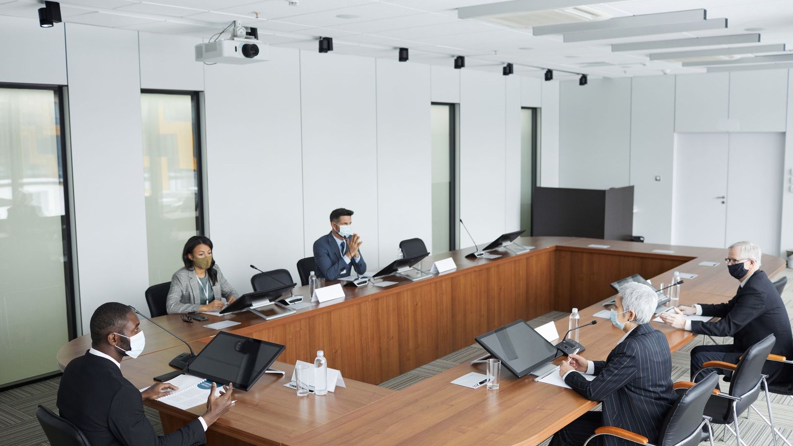 Banking and client teams reviewing transaction strategy and documents