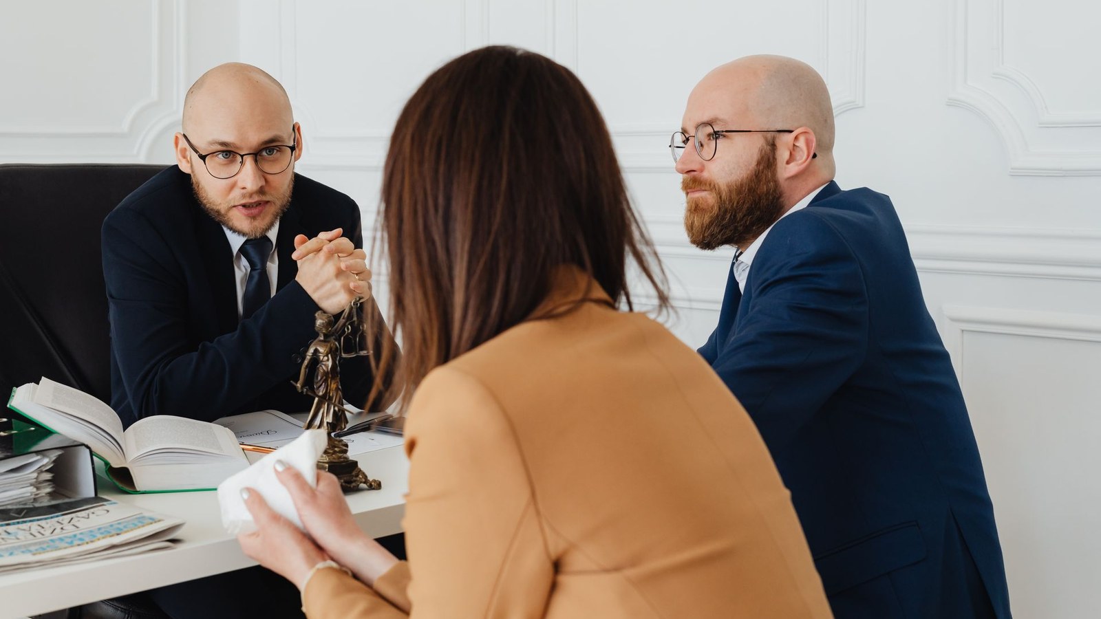 Lawyers and client representatives reviewing matter documents