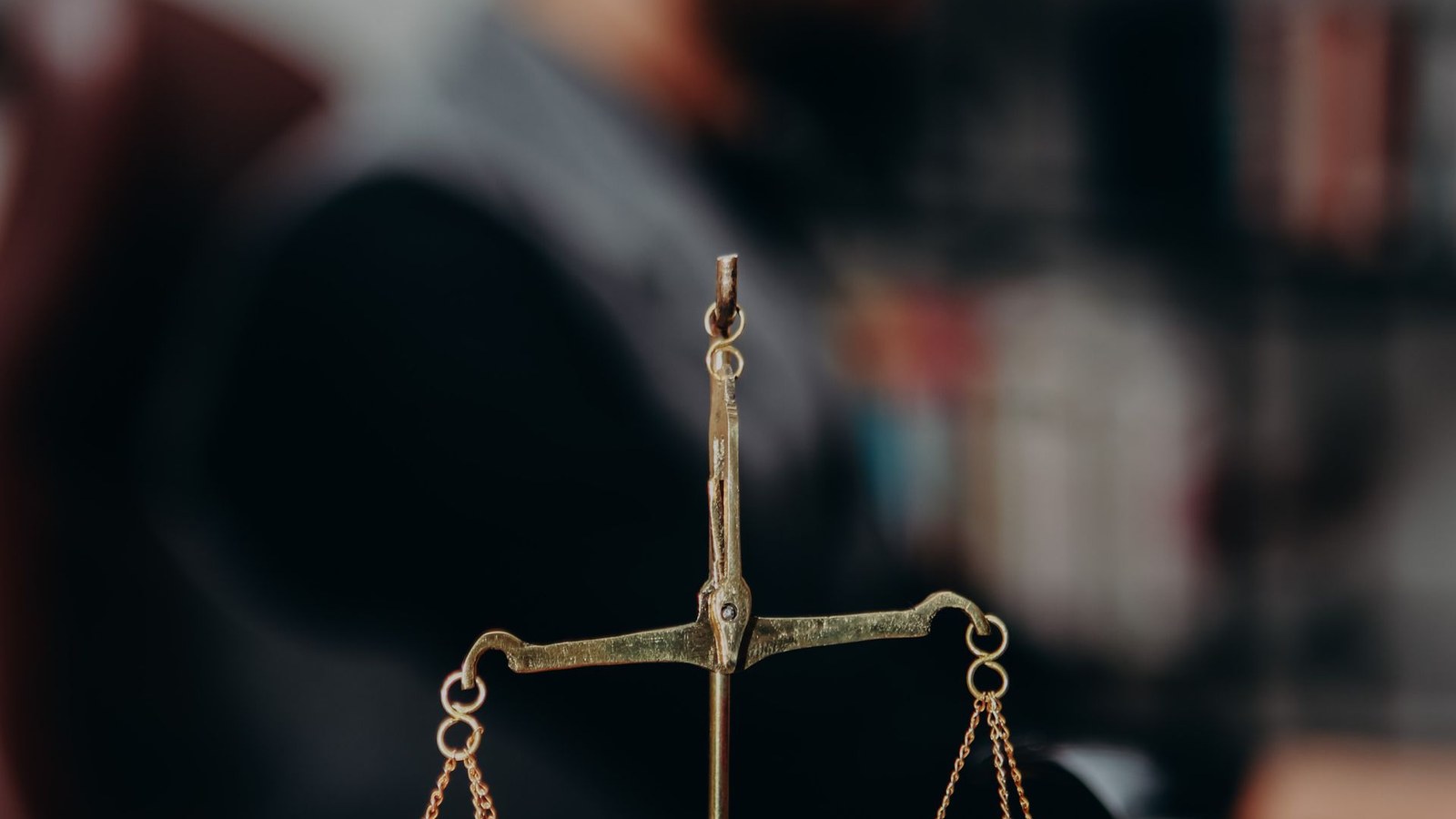 Scales of justice representing legal review and controlled evidence